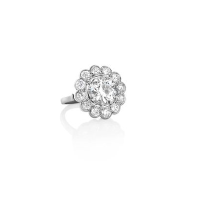 a diamond clusterer ring, by van cleef