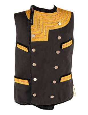 a close up of a black vest with yellow trims and buttons