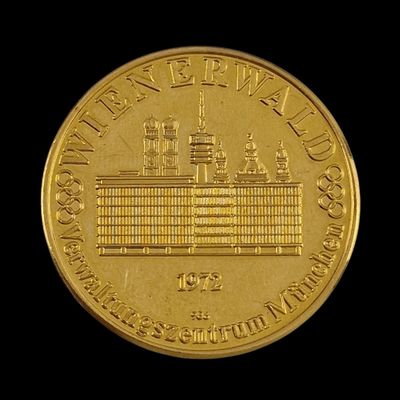 an image of a close up of a gold coin with a ship on it