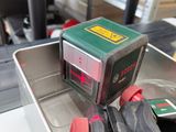 a picture of a box of tools sitting on a conveyor belt