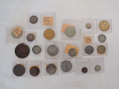 a lot of coins that are on the table