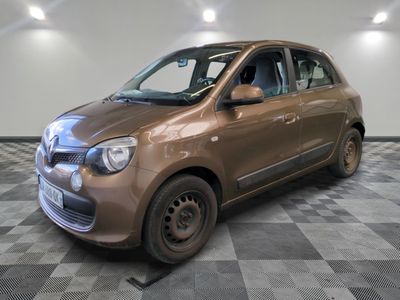 a picture of a brown car parked in a garage