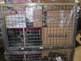 a metal cart with boxes on top of it in a warehouse