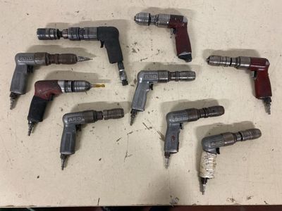 a lot of tools that are sitting on a table