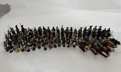 a lot of toy soldiers that are standing in the snow