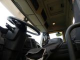 a view of the inside of a vehicle from the driver ' s seat