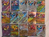 une grande collection de cartes Pokémon sur fond blanc