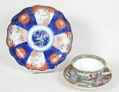 a blue and orange plate and a cup and saucer