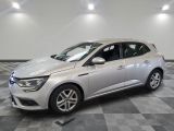 the silver car is parked in the showroom on the checkered floor