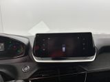 the dashboard of a car with a digital display in the center