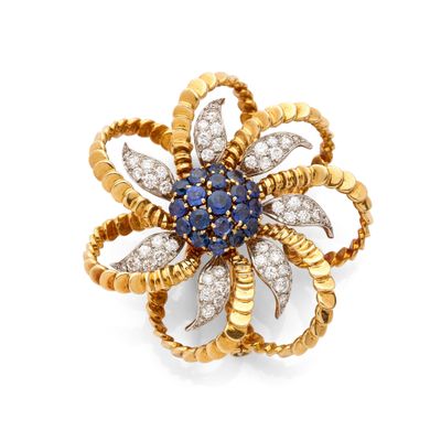 a sapphire and diamond flower broochle, by van cleef