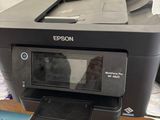 a printer that is sitting on top of a desk