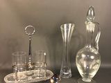 a lot of glass items that are on the table