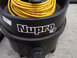 a black and yellow vacuum with a yellow hose