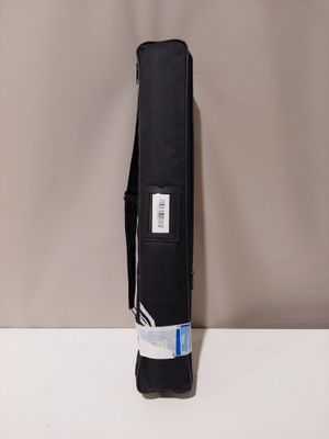 the back of a black bag sitting on top of a white table