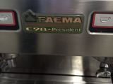 a close up of a coffee machine on a table