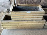 une boîte en bois contenant une sorte de bois