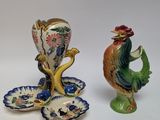 three figurines that are sitting on a table