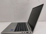 a laptop that is sitting on a white table