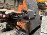 a machine that is working on a piece of metal
