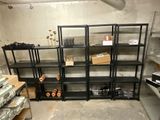 a room that has a bunch of shelves in it