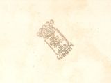 a drawing of a coat of arms and a crown on a piece of paper