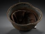 a brown bowl with a brown lid on a table