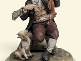 a figurine of a man sitting on a bench with a dog