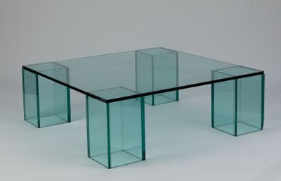 a glass table with a glass top on a white background