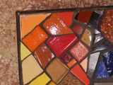 a picture of a picture of a colorful mosaic on the wall
