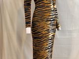 an image of a mannequin dress with a tiger print on it