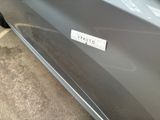 a close up of a car with a sticker on it