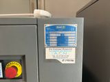 an image of a machine that has a red button on it