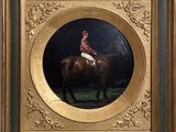 tableau représentant un jockey à cheval, dans un cadre doré