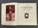 an open book with a picture of a man in a suit and tie