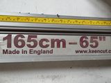 a ruler that is hanging on the side of a wall