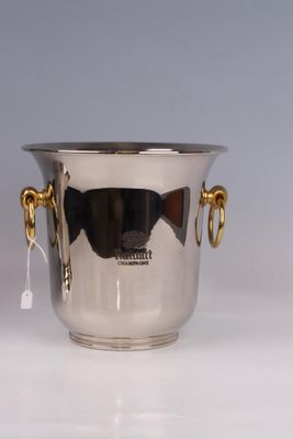 a silver ice bucket with handles and handles on a white surface