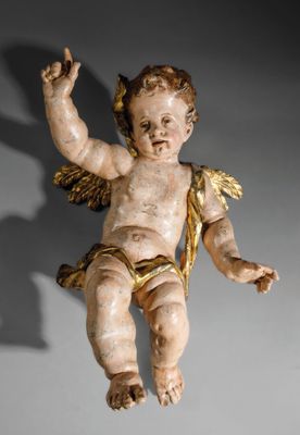 une image représentant une statue d'ange suspendue au plafond