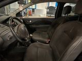 a car that is sitting in a garage with the steering wheel down