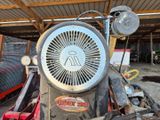 une image représentant un tracteur équipé d'un ventilateur à l'arrière