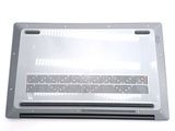 a silver laptop computer sitting on top of a white table