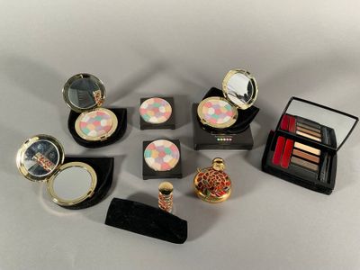 a lot of makeup items that are on a table