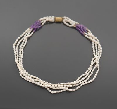 Collier de quatre rangs de perles de cultures alternées de b…