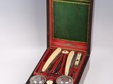 a wooden box with a set of silverware in it
