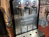 a coffee machine that is sitting on a table