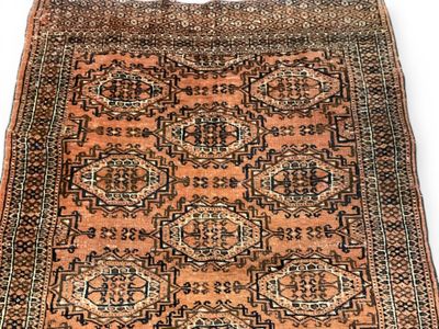 Petit tapis type kurdistan kazak, en laine à fond brun orang…
