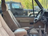 a view of the inside of a vehicle from the driver ' s seat