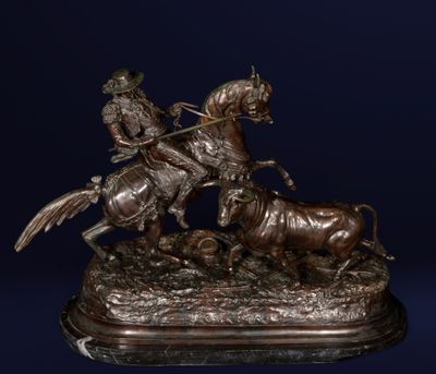 statue en bronze représentant un homme à cheval et une vache