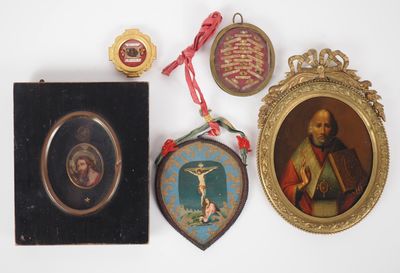three framed pictures of a man and a woman and a plaque