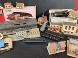 un grand nombre de trains miniatures posés sur une table